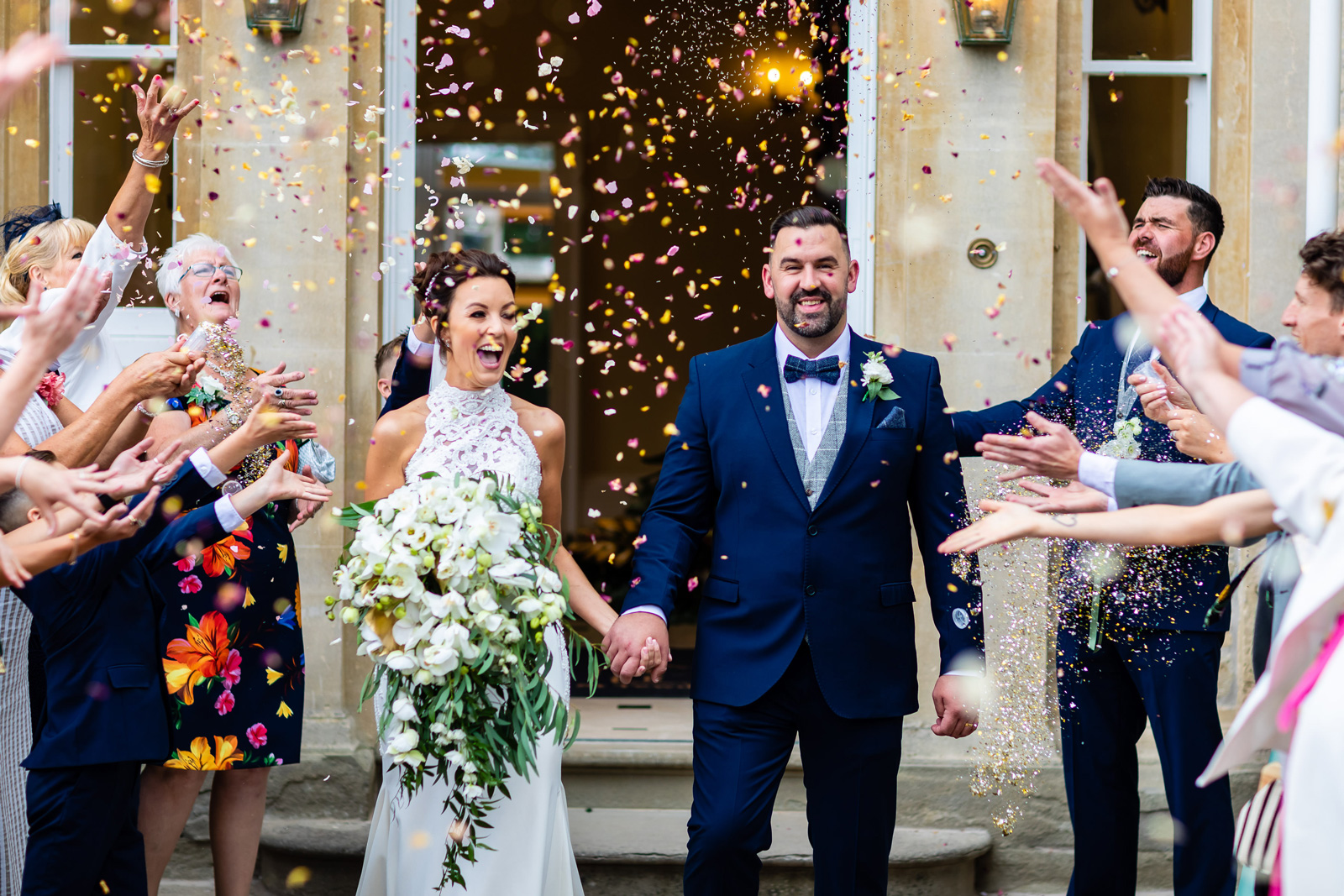 A newly married couple with confetti 